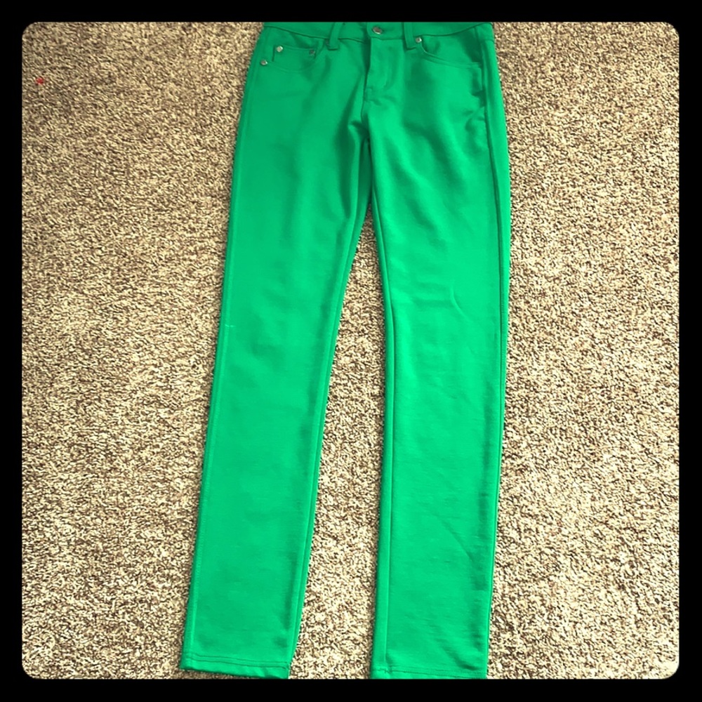 Green skinny jeans